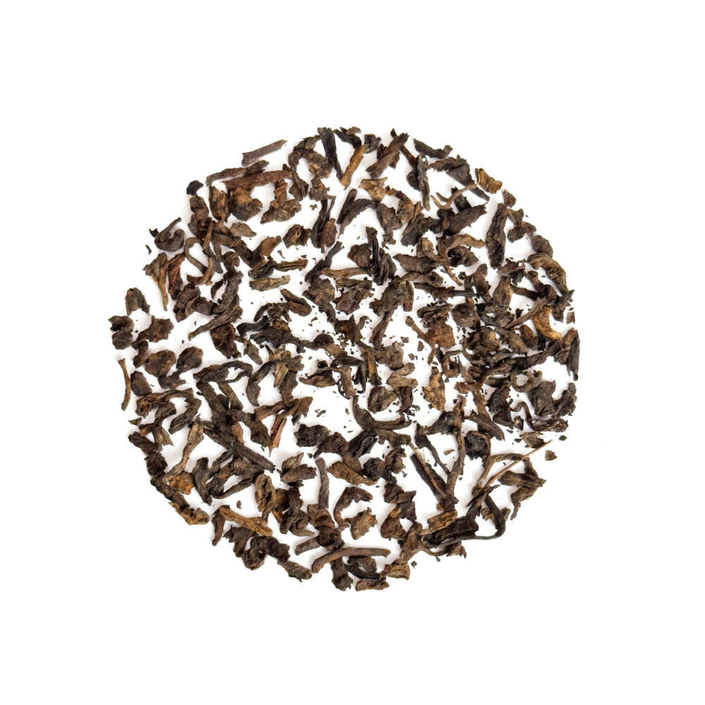 Té rojo Pu-erh Menghai 10 años · Hojas sueltas · Notas a cacao y frutos secos.