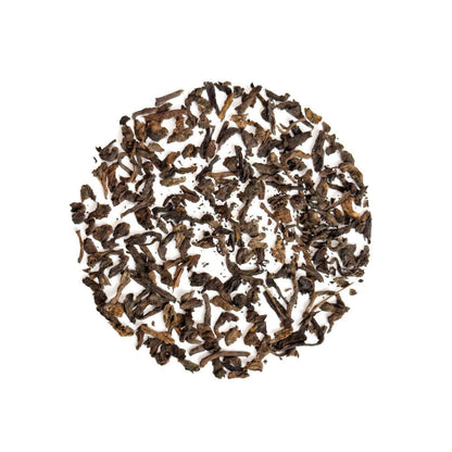 Té rojo Pu-erh Menghai 10 años · Hojas sueltas · Notas a cacao y frutos secos.